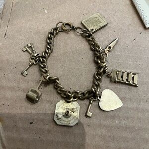 Vintage Goldbrass  Charm Bracelet truth spinner and diary/keys,